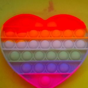 Im selling a heart rainbow pop it